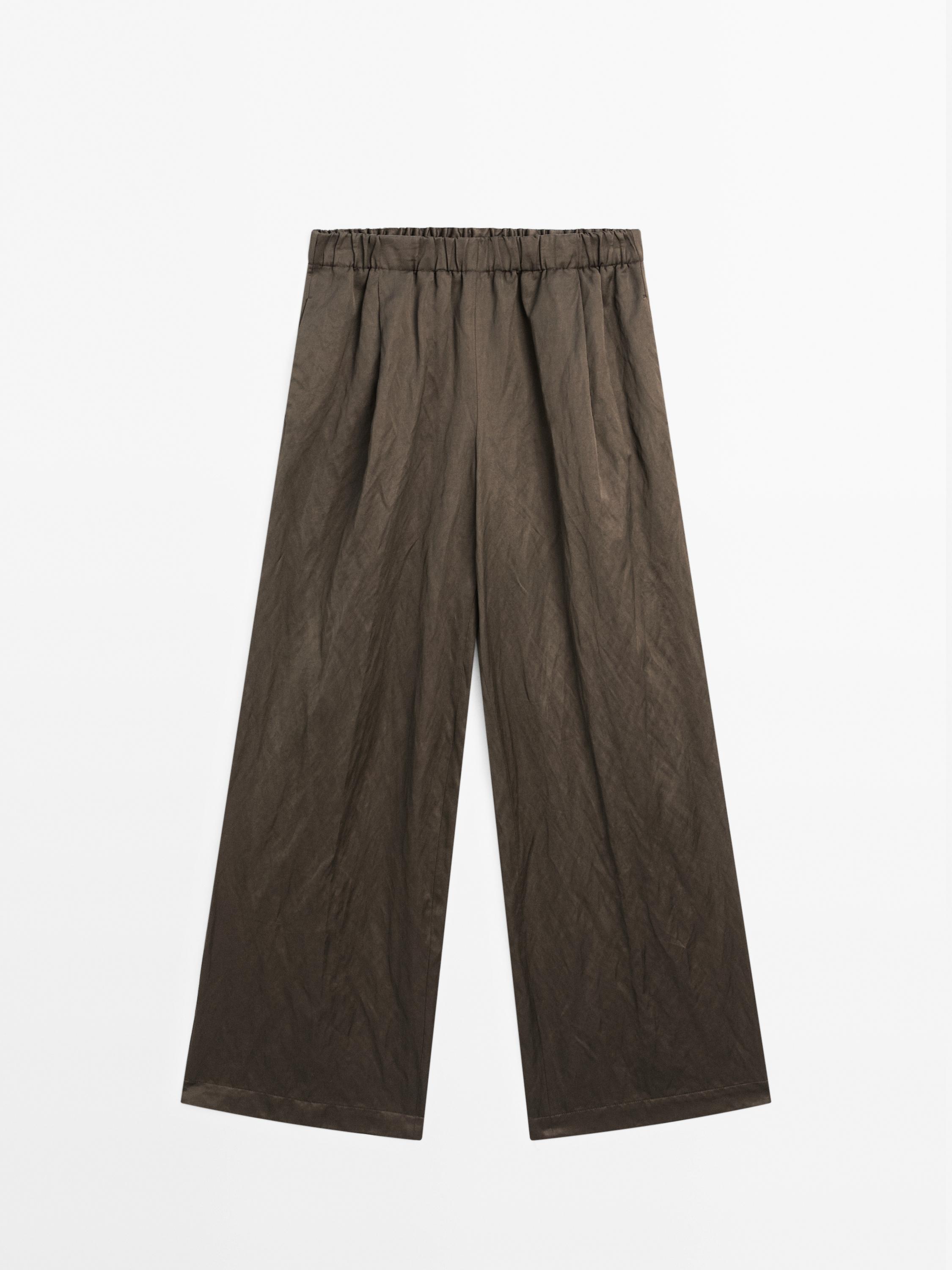 Wide-leg satin trousers with creased effect
